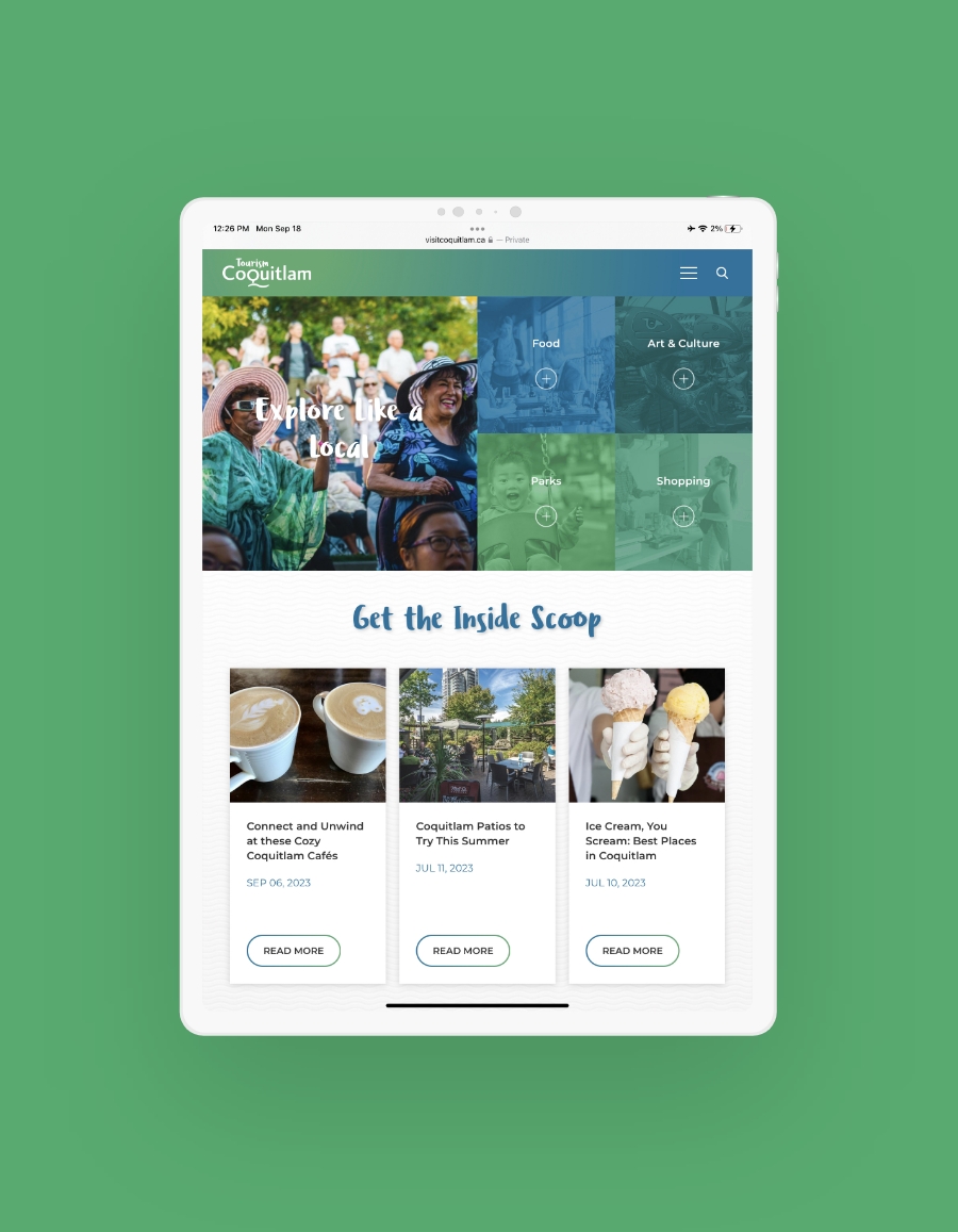 A tablet displaying the "Explore Like a Local" section of the Tourism Coquitlam website. The page features a grid layout with categories for Food, Parks, Art & Culture, and Shopping. Below this section are articles, such as "Connect and Unwind at these Cozy Coquitlam Cafés," with images and call-to-action buttons to read more.